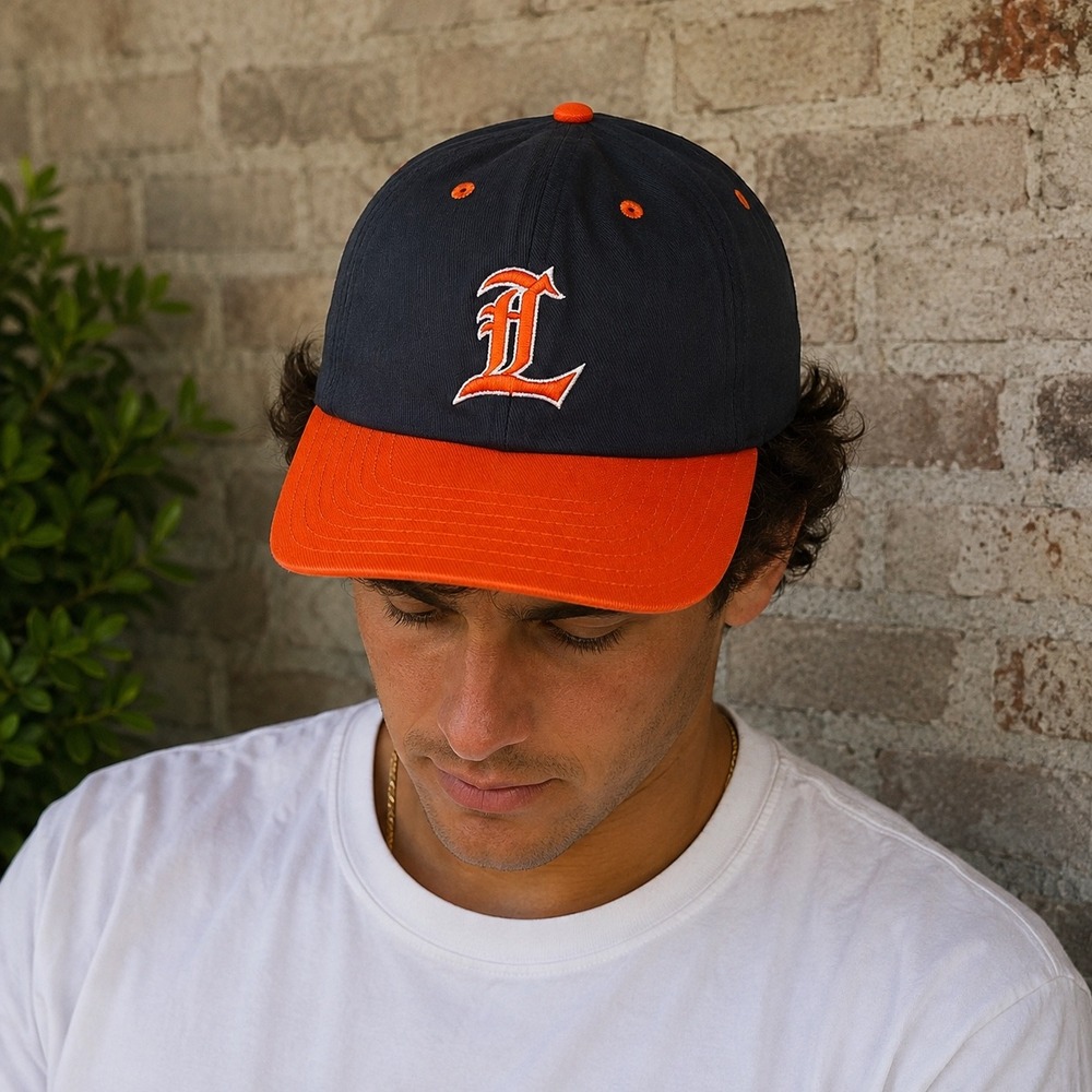Vintage New Era Hat Size 7 1/4 Black Orange Pro Model Baseball Made in USA Logo